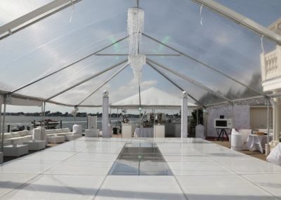 c clear top wedding tent set up with a wedding venue inside